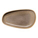 An oval asymmetric brown porcelain platter with a raised rim and speckled design.