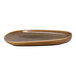 An oval, brown porcelain platter with an asymmetric raised rim and a speckled interior.