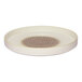 A round porcelain plate with a raised rim, featuring a brown patterned center and cream-colored edges.