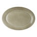 An oval-shaped, beige porcelain platter.