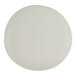 A round, off-white porcelain coupe plate with a smooth finish.