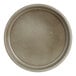 A round, 6 1/2 inch porcelain serving tray with a neutral, earthy finish.