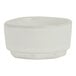 A small, round, white porcelain ramekin.