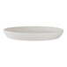 A round, white porcelain plate with a slightly raised rim.