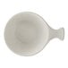 A white porcelain bowl with a handle, shaped like a shell.
