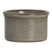 A round, gray porcelain ramekin with a slightly flared rim.