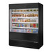 A 60-inch refrigerated air curtain merchandiser filled with assorted food and beverage items.