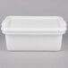 A white Tablecraft plastic container with a lid.