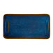 A blue rectangular porcelain platter with a speckled finish and rounded edges.