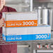 A pair of large boxes of Choice 18-inch by 3000-foot foodservice cling film with serrated cutters.