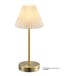 A mid-century modern matte brass battery-powered LED table lamp with a beige pleated linen shade.