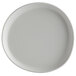 A light gray, round matte melamine coupe plate with an irregular edge.