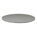 A round, storm gray indoor table top with an eased edge.