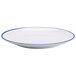 A white round melamine dinner plate with a cobalt blue trim.