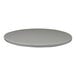 A round, storm gray indoor table top with an eased edge.