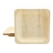 A set of square birch wood plates with rounded corners.