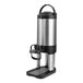 A brushed stainless steel thermal coffee server with a hands-free dispensing stand.