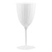A white plastic wine goblet with a fluted design and a single-piece construction.