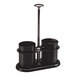 A black onyx stainless steel sugar stick holder and creamer set with two cylindrical containers on a tray.