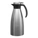 A stainless steel insulated coffee server with a black push button lid and handle.