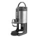 A brushed stainless steel thermal coffee server with a hands-free dispensing mechanism and a black stand.