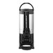 A 1.5-gallon brushed stainless steel thermal coffee server with a hands-free dispensing stand.
