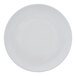A plain white round porcelain coupe plate.