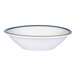 A small bright white porcelain fruit bowl with a blue band around the rim.