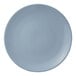 A round, light blue porcelain coupe plate.