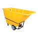 A large yellow heavy-duty bulk tilt truck with a 1 cubic yard capacity and sturdy wheels.