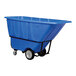 A blue heavy-duty bulk tilt truck with a large plastic container and sturdy wheels.