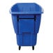 A blue medium-duty bulk tilt truck with a 1 cubic yard capacity and wheels for easy transport.