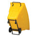 A yellow medium-duty bulk tilt truck with a black handle and wheels.