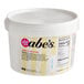 A large white tub of Abe's vegan vanilla frosting.