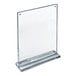 A clear acrylic magnetic block frame with a rectangular base designed to hold 8 1/2" x 11" portrait displays.