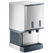A stainless steel countertop nugget ice machine and water dispenser with push button dispensing.