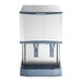 A countertop nugget ice machine and water dispenser with hands-free dispensing and a 25 lb. bin capacity.