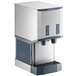 A stainless steel countertop nugget ice machine and water dispenser with push button controls.
