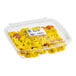 A clear plastic container filled with Fresh Origins marigold edible flowers.