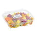 A clear plastic container filled with a premium assortment mix of edible flowers.