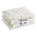 A case of 100 fresh white decorative edible orchid flowers packaged in clear plastic boxes.