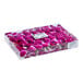 A clear plastic box containing 100 fresh purple edible orchid flowers.