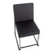 A black faux leather high back side chair with a black brushed stainless steel frame.