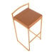 A gold steel barstool with a low back and a camel faux leather seat.