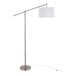 A brushed nickel floor lamp with an off-white linen drum shade and a modern, minimalist design.