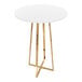 A round white bar height table with a gold metal base.
