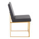A modern side chair with a black faux leather high back and seat, featuring a gold brushed stainless steel frame.