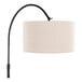 A floor lamp with an oil bronze metal curved stand and a natural linen drum shade.