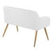 A white faux leather high back bench with armrests and gold steel legs.