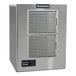 A stainless steel Scotsman air-cooled small cube ice machine with front vents and control panel.